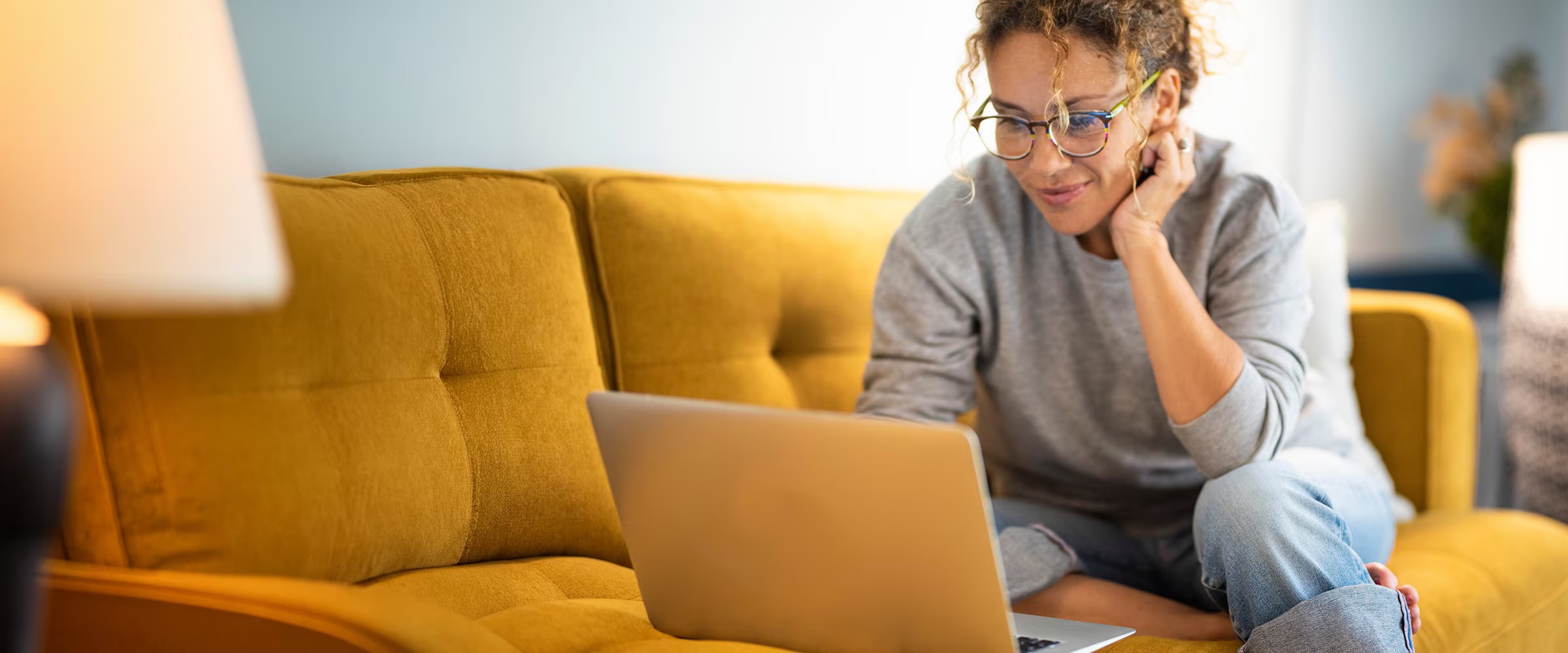 Woman using laptop for AI-powered shopping