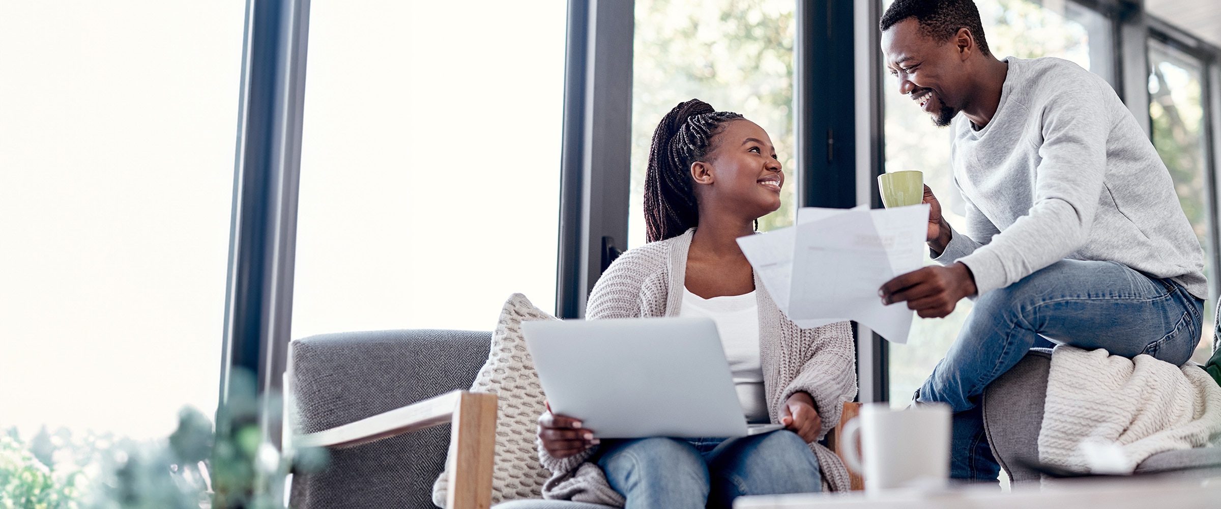 African American couple going over finances together.